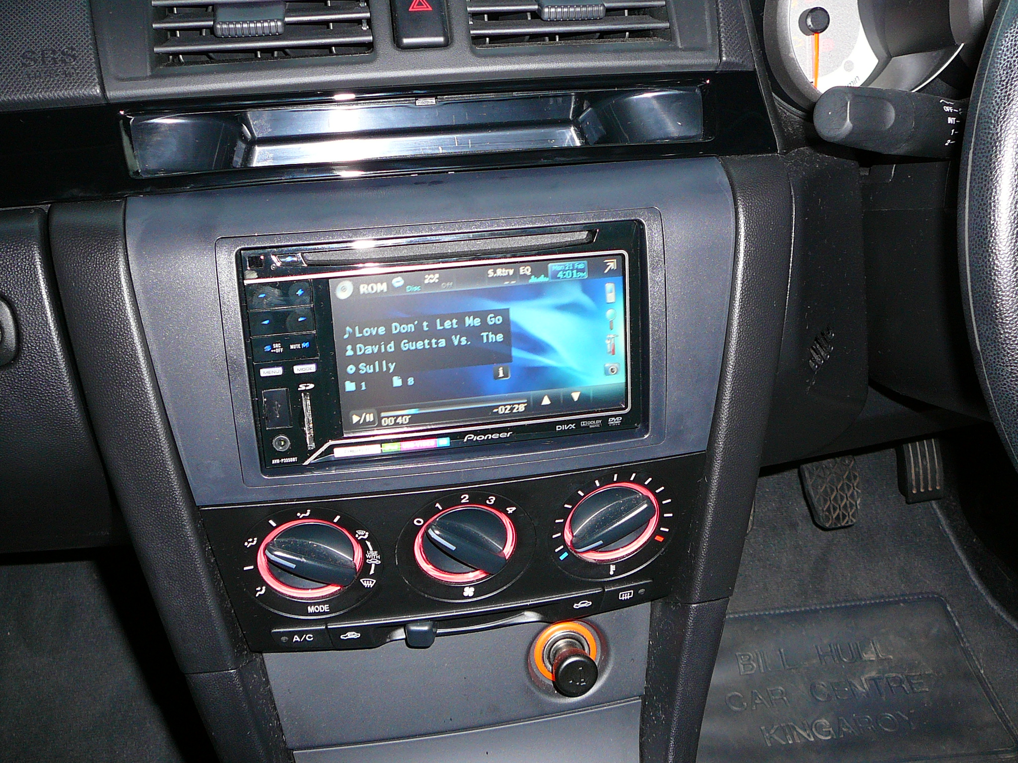 Mazda 3, Pioneer DVD ipod radio with aftermarket dash kit