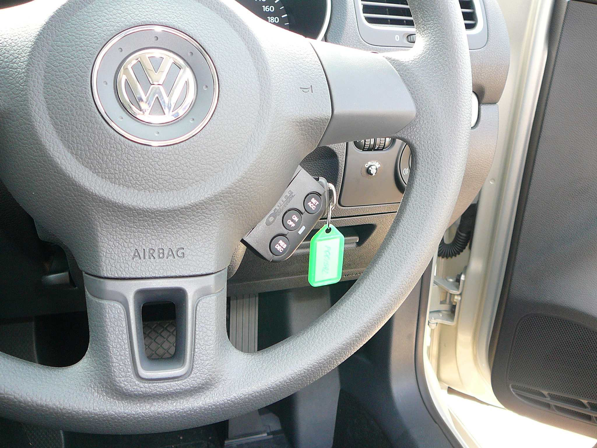 VW Golf 2012 Cruise control steering wheel mount